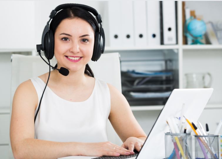 A lady equipped for online calling in a professional environment