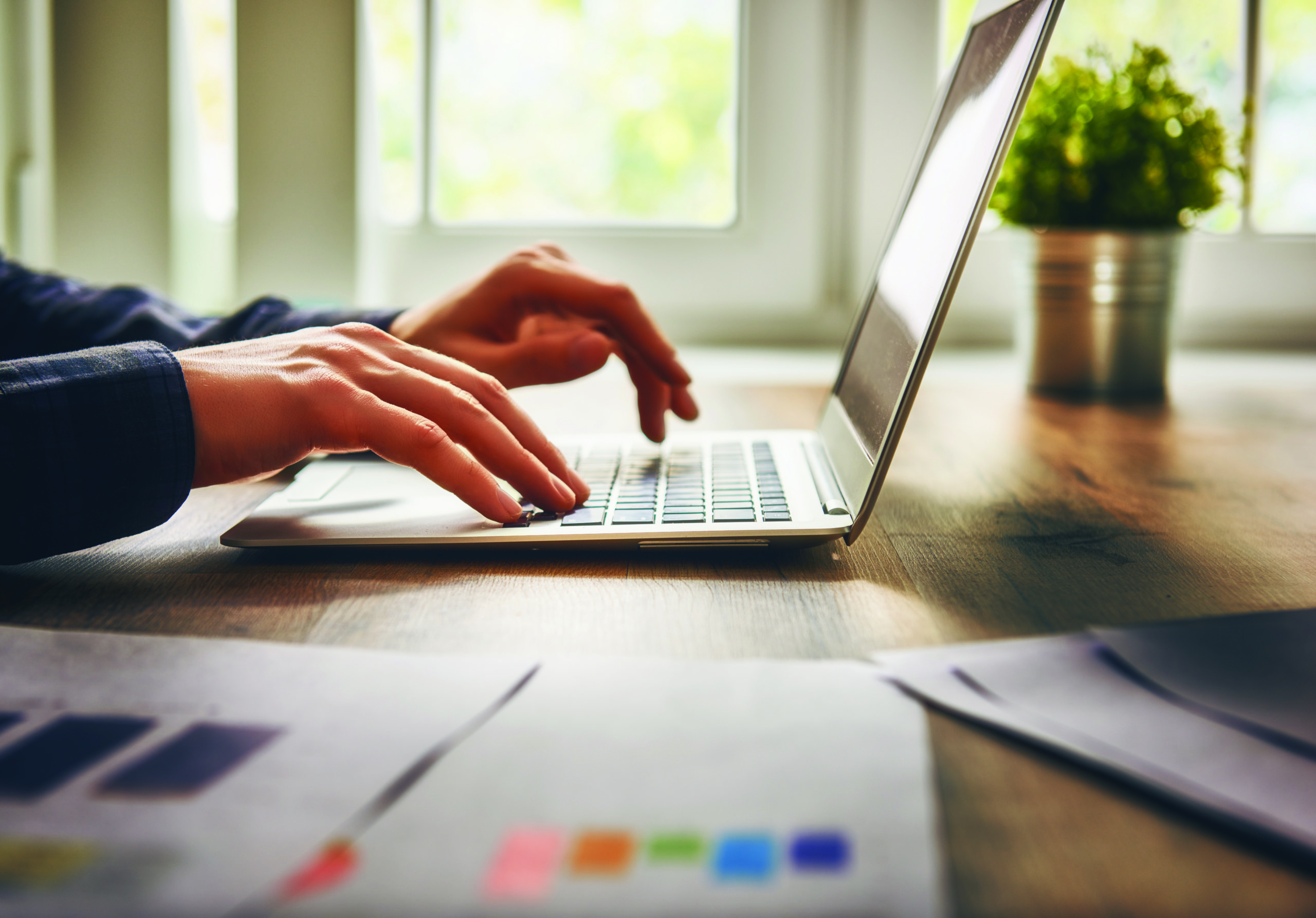 Business man using a laptop and working with business data